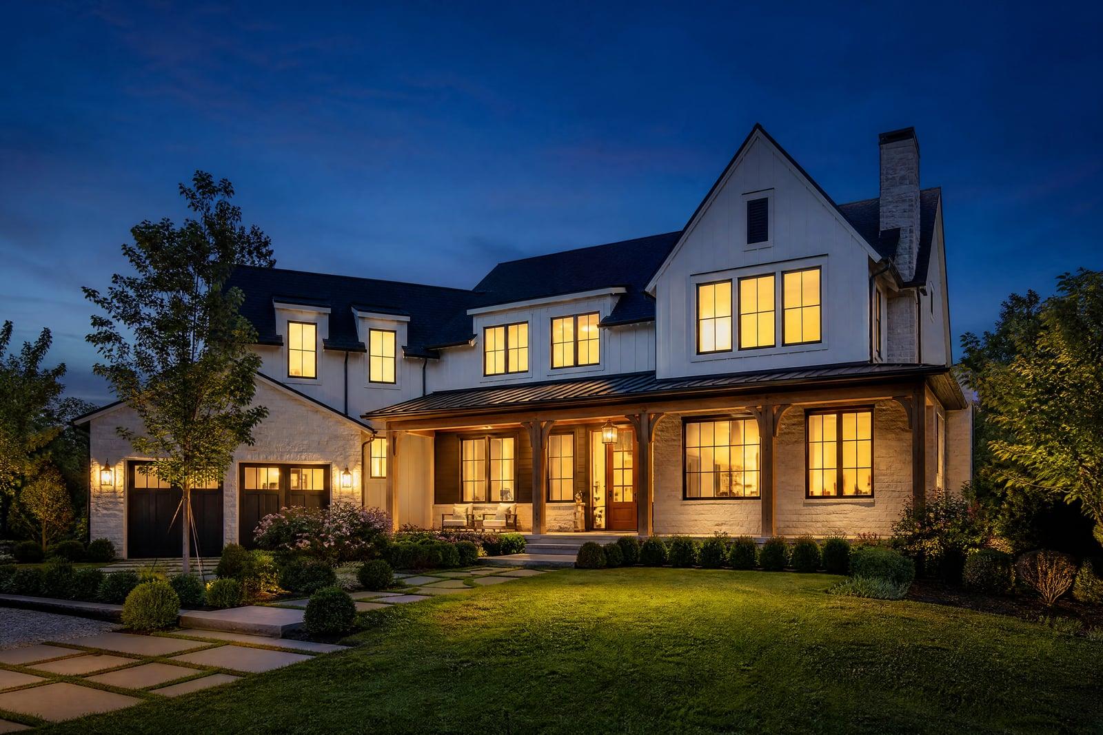 Day to Dusk example: a home exterior converted from daytime into a glowing twilight photo